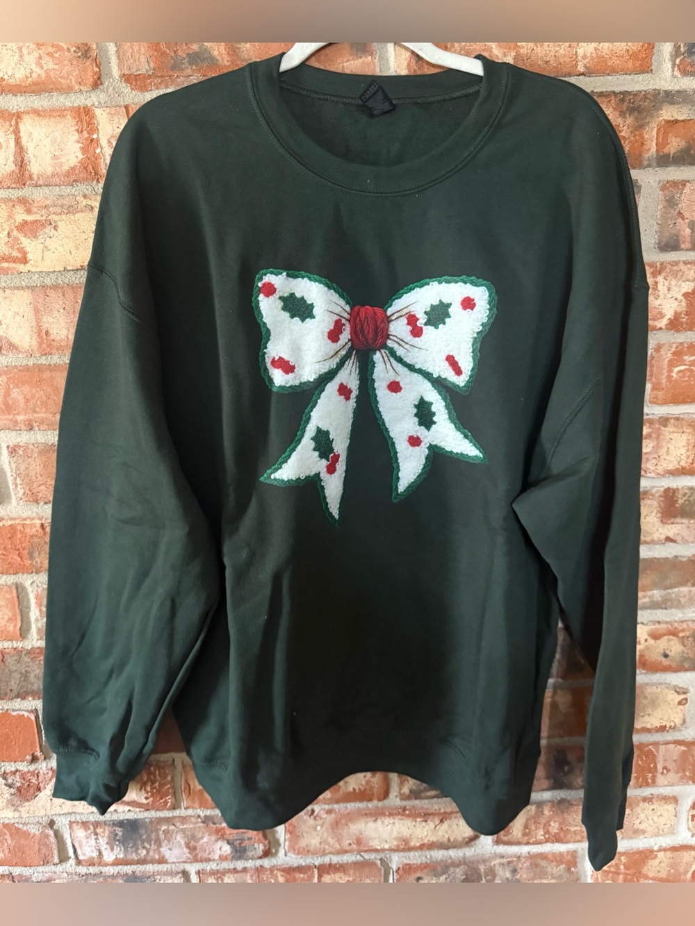 Gildan Dark Green Crewneck Sweater with Festive Bow Applique